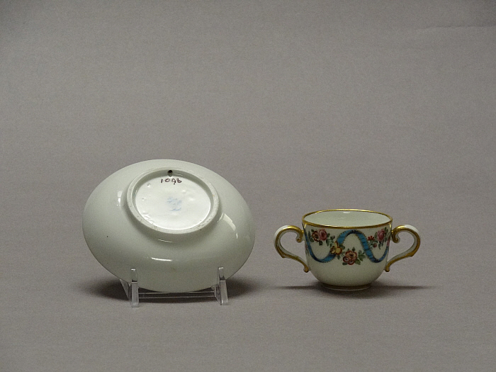 Two-Handled Cup and Saucer Slider Image 2